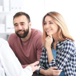 Couple consulting with fertility specialist about signs of infertility | Dallas IVF | Frisco, TX