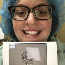 Kelsey with a photo of her embryo conceived with IVF treatment | Dallas IVF | Frisco, TX